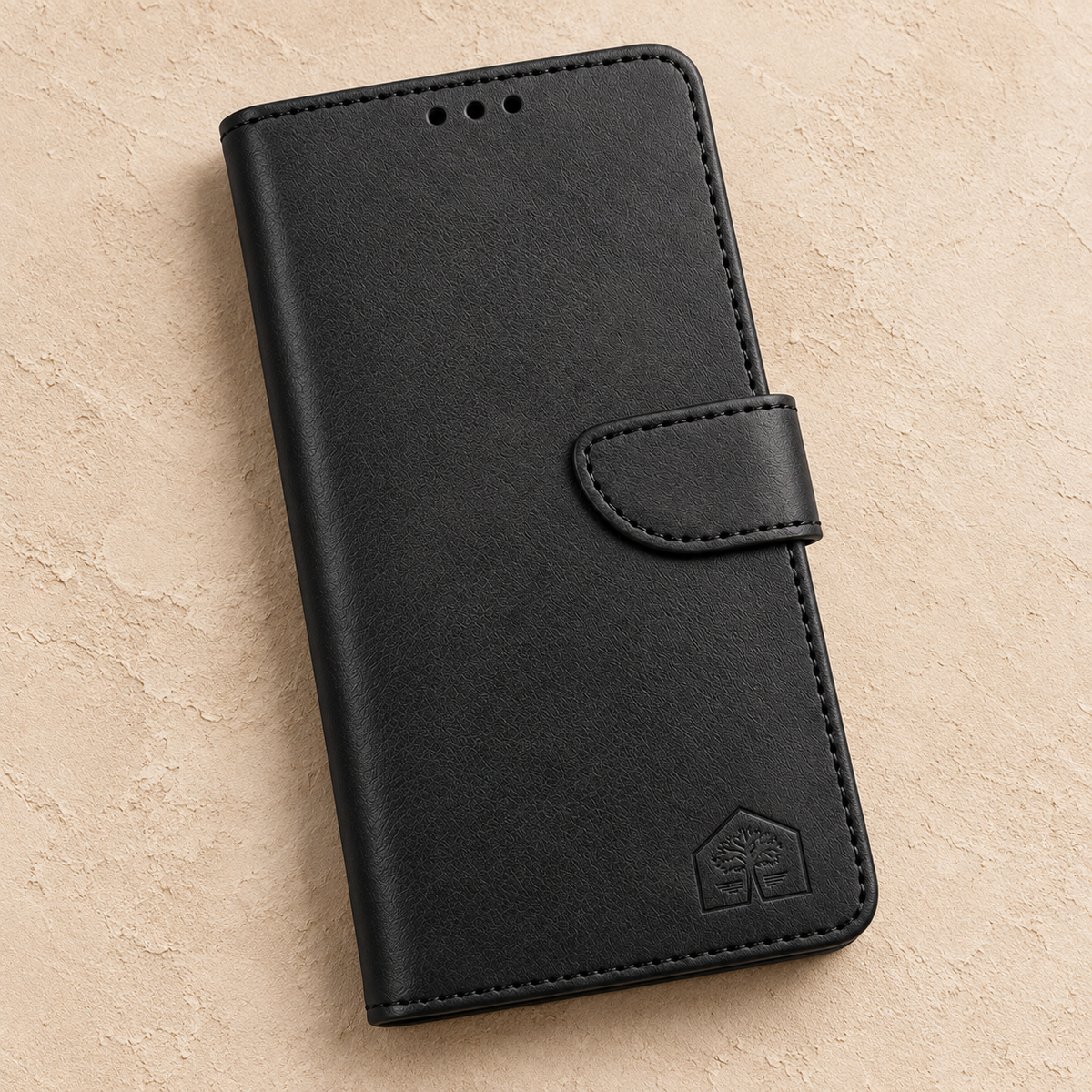 Black wallet phone case, closed front view, ceramic studio